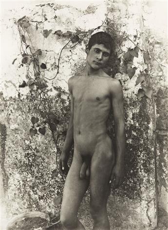WILHELM VON GLOEDEN (1856-1931) Nude Leaning Against a Wall.                                                                                     